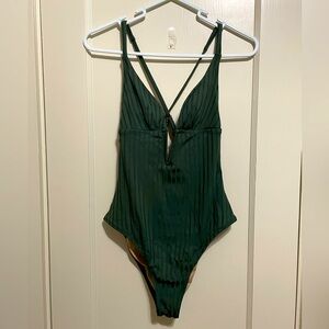 Green, deep slit flattering lined swim suit